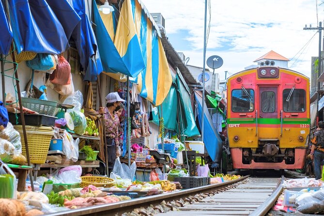 Amphawa Floating Market & Maeklong Railway Train Market Tour - Wat Bang Kung and its tree-covered shrine