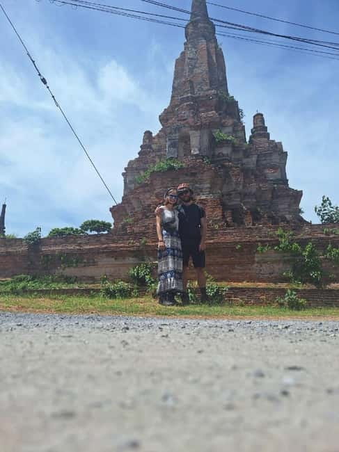 Ayutthaya: Colorful Slow Life Bicycle Tour with local guide. - Wat Mahathat and the famous Buddha head