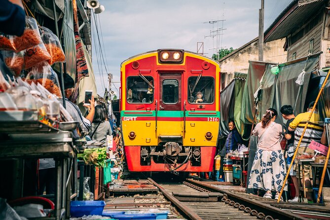 Ayutthaya, Maeklong Railway, Damnoen Saduak Floating Market - Maeklong Railway Market: food stalls beside the tracks