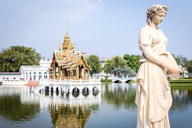 Ayutthaya Sunset Tour: Iconic Temples & Scenic River Boat Ride - Wat Mahathat and Ayutthaya’s famous Buddha head