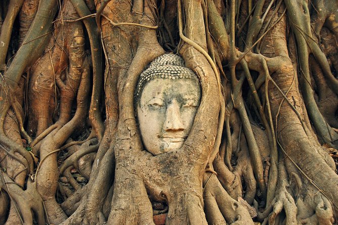 Ayutthaya Sunset Tour: UNESCO Temples & Peaceful River Cruise - Wat Yai Chai Mongkol and Its Reclining Buddha