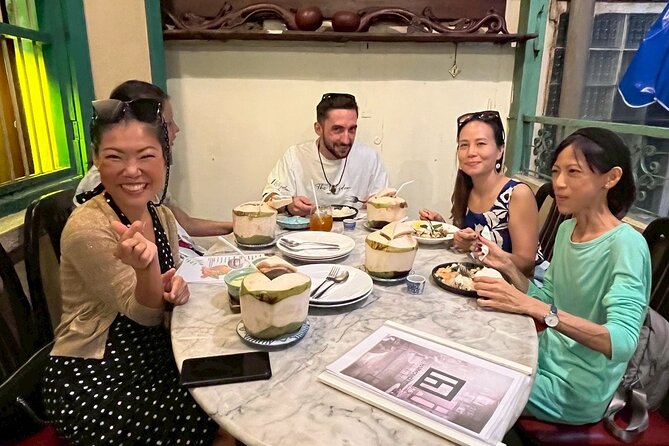 Bang Rak Backstreets: Local Bites & Culture Walking Tour - Meeting Poon, Uma, or another local guide at Saphan Taksin