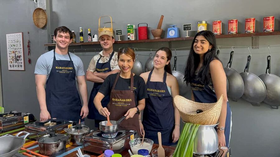 Bangkok: Authentic Thai Cooking Class with Local Host - Cooking four Thai dishes by hand