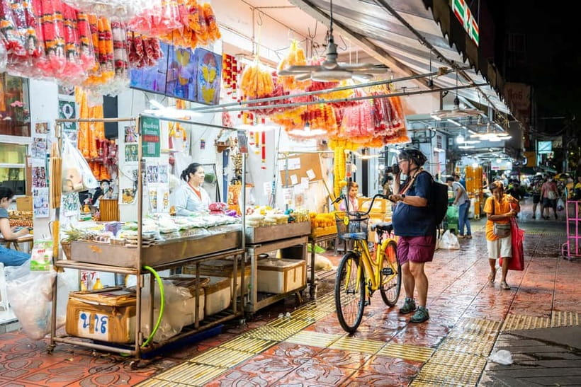 Bangkok by Night Cycling Tour with Street-food Meal - Riverside views of bridges, temples, and the skyline