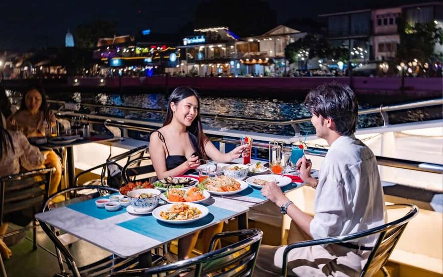 Bangkok: Carnival Dinner Cruise with Free-Flow Beer & Buffet - Arriving at the Riverside Bangkok Hotel pier