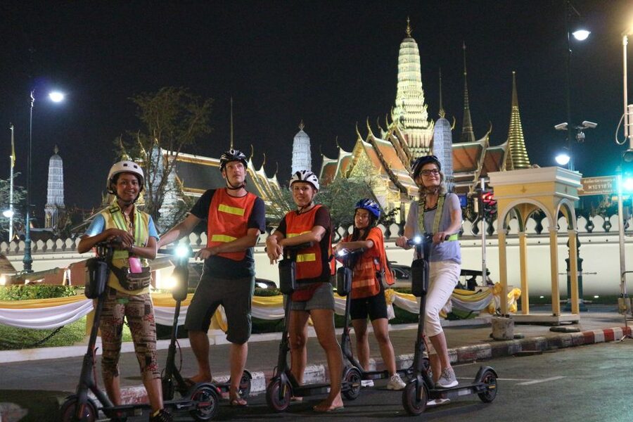 Bangkok: E-Scooter Night Tour with Local Street Food - Wat Arun and Santa Cruz Church by the river