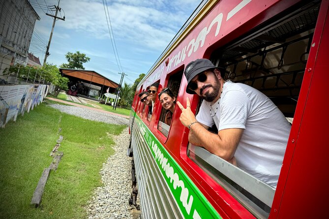 Bangkok: Floating Market and Train Market Experience - Watching the train at Maeklong Railway Market