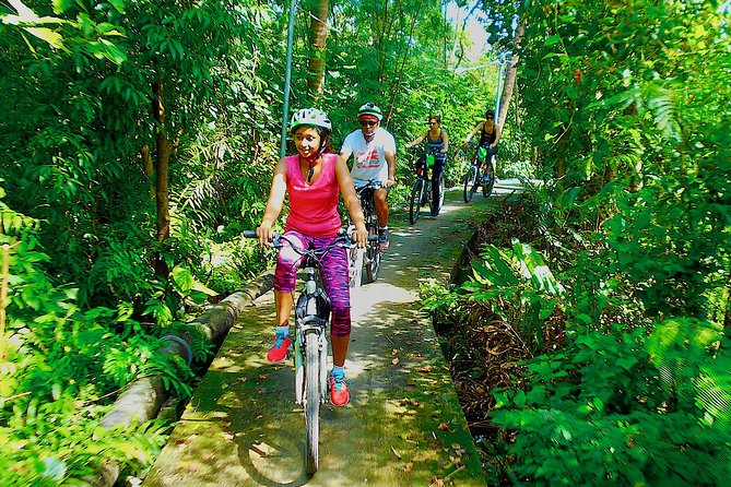 Bangkok Green Oasis 4-Hour Bike Tour with Boat Ride - Sri Nakhon Khuean Khan Park and Botanical Garden
