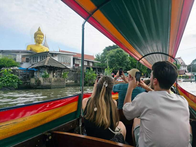 Bangkok Long Boat Canal a Big Buddha & Culture Markets Tour - Seeing Wat Paknam’s Big Buddha from the canal