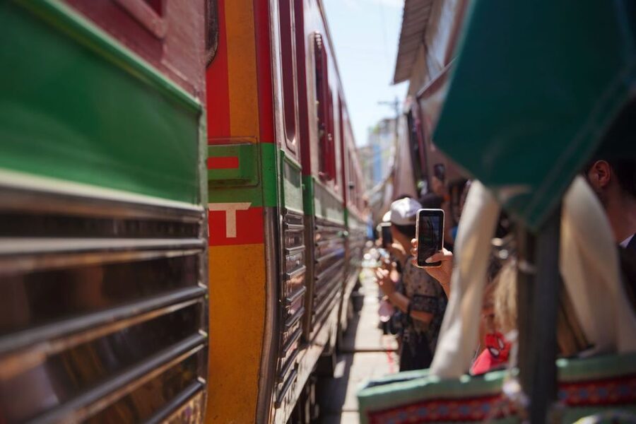 Bangkok: Maeklong Railway Market & Floating Market Tour - Tasting your way through the market