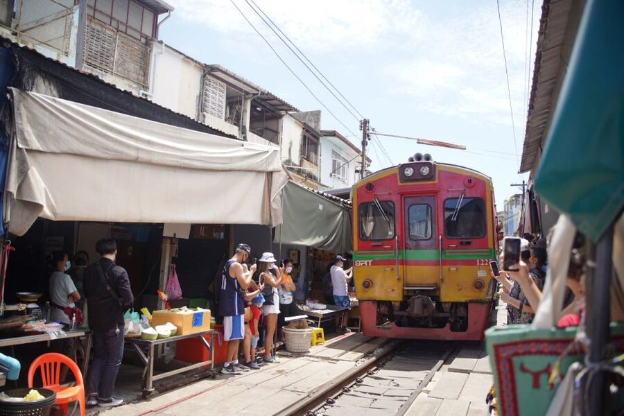 Bangkok: Maeklong Railway Market & Floating Market Tour - Maeklong Railway Market and the famous train passage