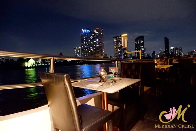 Bangkok Meridian Dinner Cruise from ICONSIAM - Wat Arun reflected on the Chao Phraya