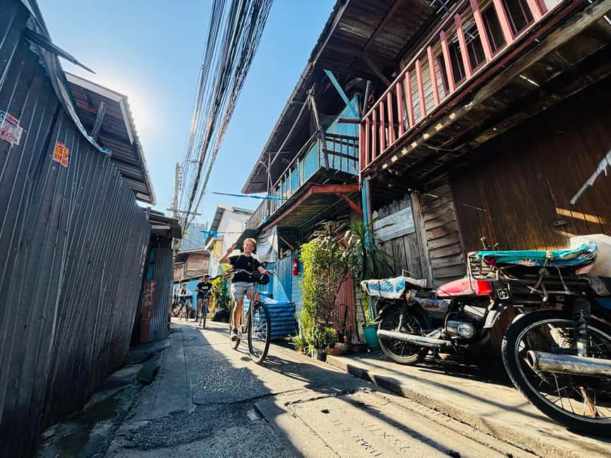 Bangkok: Temples, Canals & Local Life Bike Tour - Talat Phlu: a first look at neighborhood Bangkok