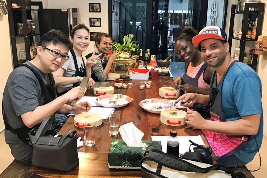 Bangkok: Thai Cooking Class and Onnuch Market Tour - Cooking Four Thai Favorites