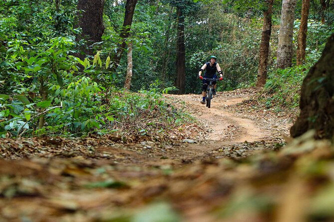 Buffalo Soldier Full Day Mountain Biking Tour Chiang Mai - Riding through forest, roads, and villages