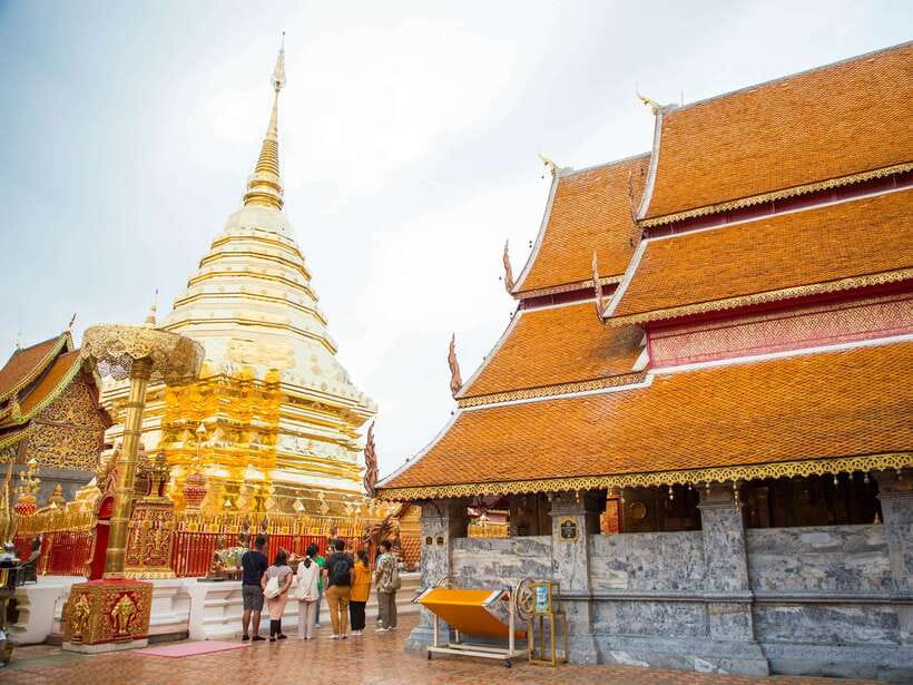 Chiang Mai: Doi Suthep, Wat Umong, and Pha Lat Sunrise Tour - Wat Umong, tunnels, and a forest setting