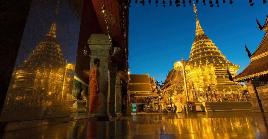 Chiang Mai: Doi Suthep & Wat Umong Twilight Tour with Pickup - Doi Suthep after sunset: gold, stairs, and city lights