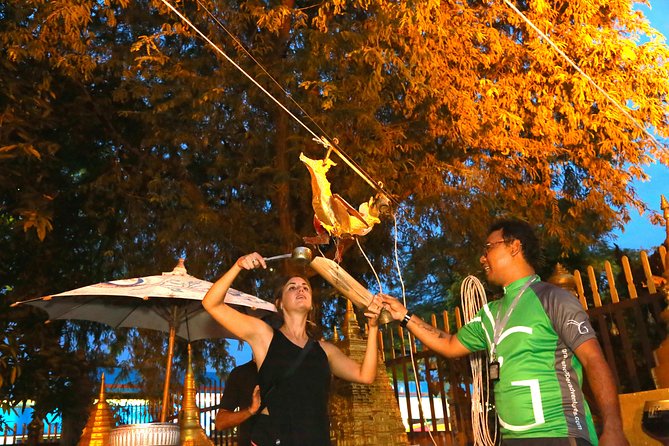 Chiang Mai Night Bike Tour - Wat Chedi Luang and the city’s protective symbols
