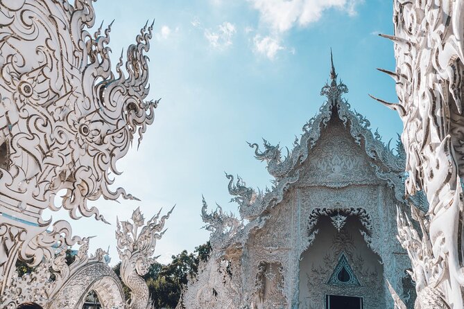 Chiang Rai Famed Temples and Golden Triangle Tour from Chiang Mai - Wat Rong Khun turns a temple into modern art