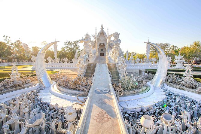 Chiang Rai Full Day Tour with Boat Trip and Longneck Village - Wat Rong Seur Ten is the most refreshing temple visit