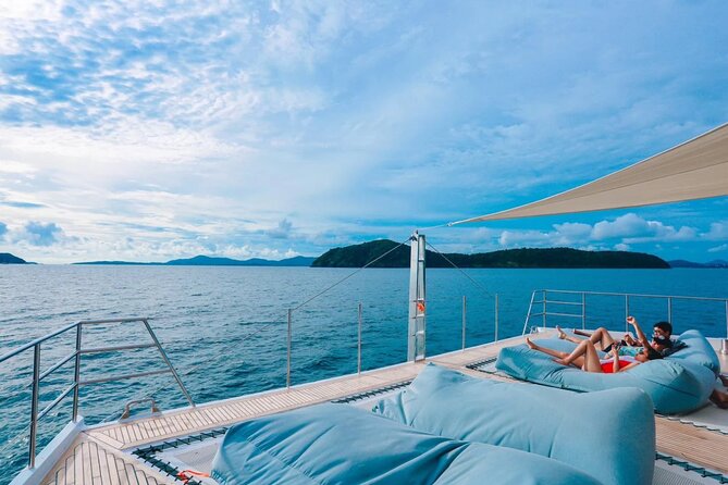 Coral and Racha Islands Luxury Catamaran Experience - Coral Island: beach time, water sports, and busy energy