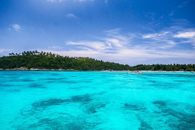 Coral Island Snorkeling Tour By Speedboat From Phuket - Lunch, drinks, towels, and beach chairs