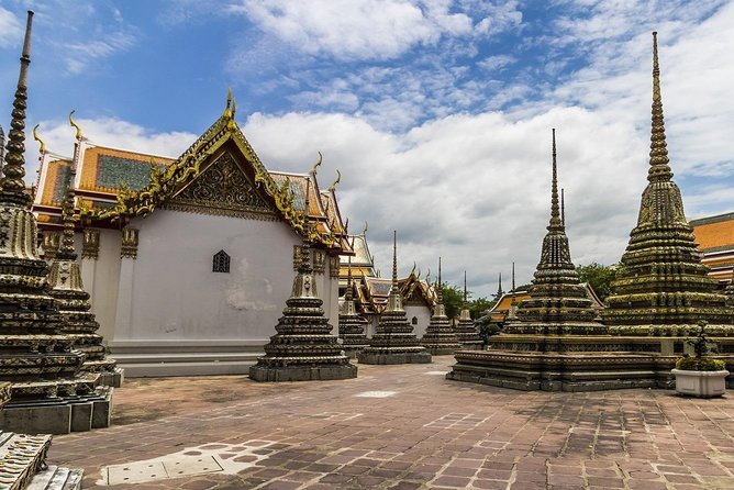 Cultural Treasures of Bangkok: Temples & Royal Palace Tour - Timing, heat, clothing, and comfort