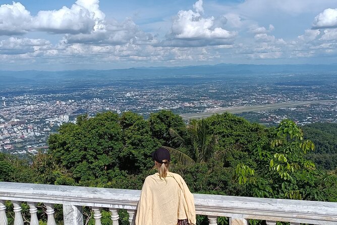 Doi Suthep Temple Tour by Local Red Car 3 Hour Adventure - What the guide adds to the visit