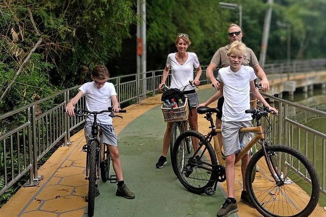 Family Bicycle Tour in the Green Oasis of Bangkok on Bamboo bikes - Meeting at Khlong Toei and crossing the river