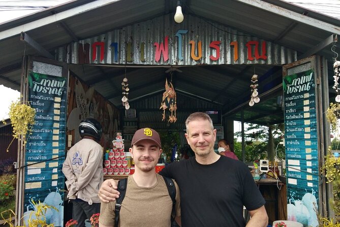 Floating & Railway Markets and Erawan Waterfall [Optional Luxury] - Riding the train into Mae Klong Market