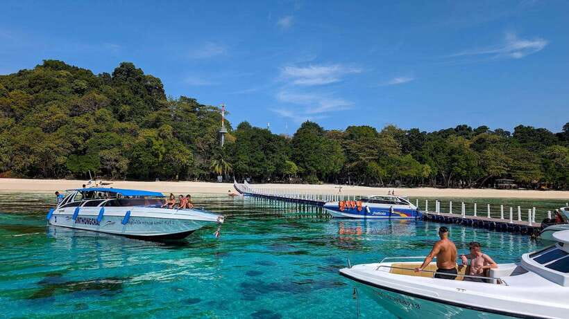 From Koh Lanta: Koh Haa & Koh Rok Snorkel Tour by Speedboat - Koh Haa: turquoise water and coral gardens