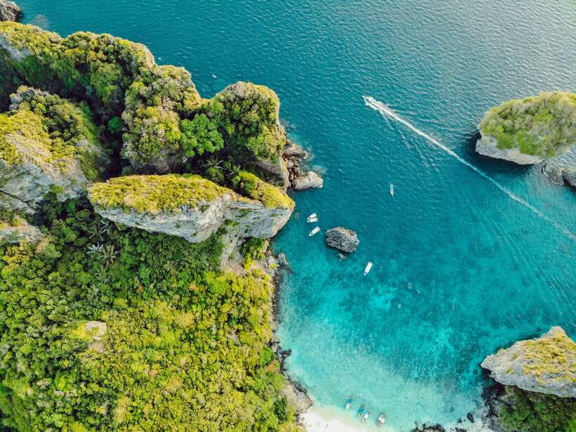 From Phi Phi: Full Day 7 Island Tour by Longtail with Sunset - Loh Samah Bay adds coral and quieter water