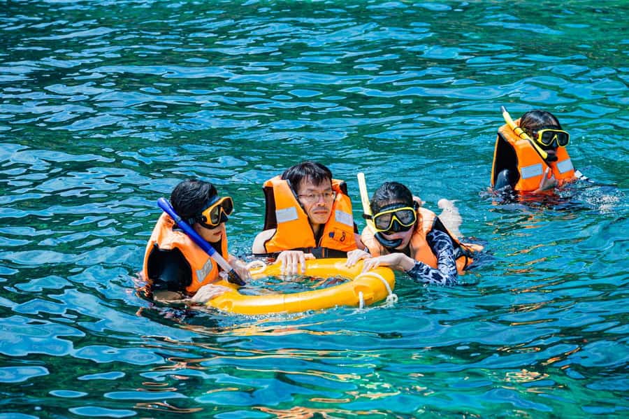 From Phuket: Coral Island Kahung Beach Speedboat Trip - Pickup in Phuket and the Run to Chalong Pier