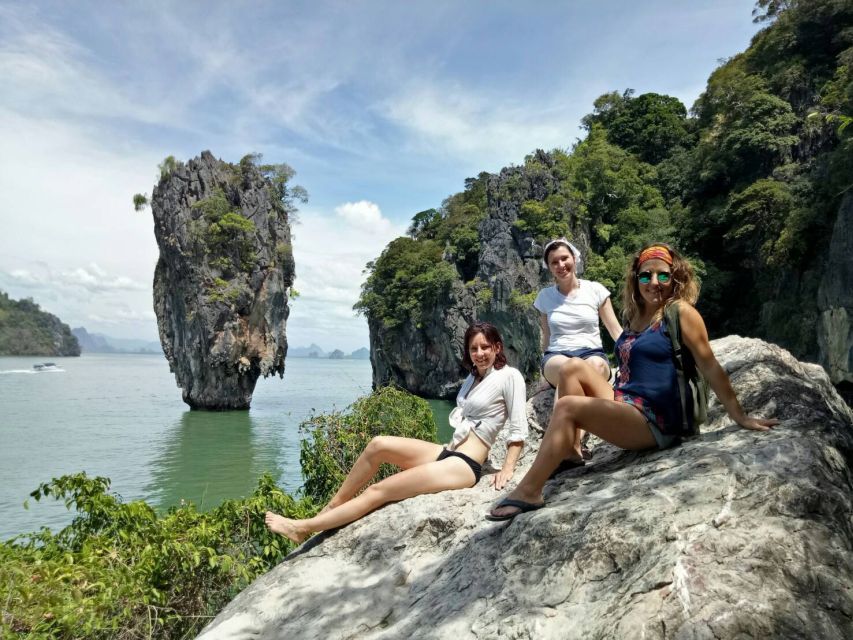 From Phuket: Phang Nga Bay and Canoeing Tour by Big Boat - Guides, canoe paddlers, and the human side