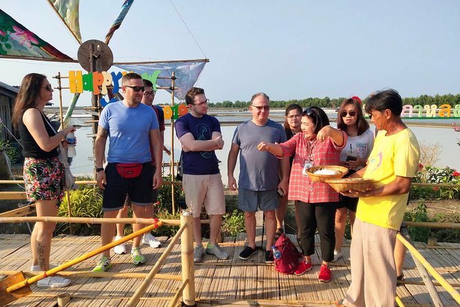 Half-Day Railway Market and Floating Market Tour in Thailand - Heat, crowds, and the train ride