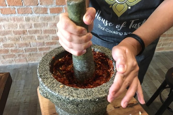 Hands on Thai Cooking Class and Market Tour - Eating four dishes is part of the lesson