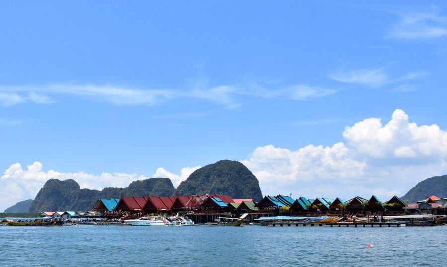 James Bond Island: Sightseeing Tour by Longtail Boat & Kayak - Riding a traditional longtail boat across Phang Nga Bay