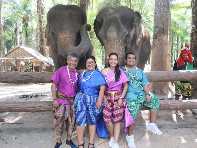 Krabi: Elephant Feeding Program with Traditional Thai Dress - Weather, insurance, and simple preparation