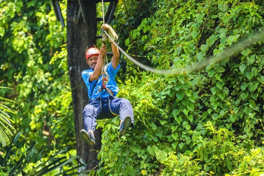 Krabi: Zipline, ATV & Top Rope Climbing Experience - Flying through the Krabi canopy