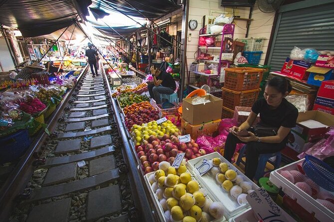 Maeklong Railway Market and Damnoen Saduak Floating Market Tour From Bangkok - Cruising Damnoen Saduak by long-tail boat