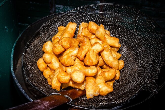 Northern Flavours Chiang Mai Food Tour with 15+ Tastings - Stop one: learning the food before filling up