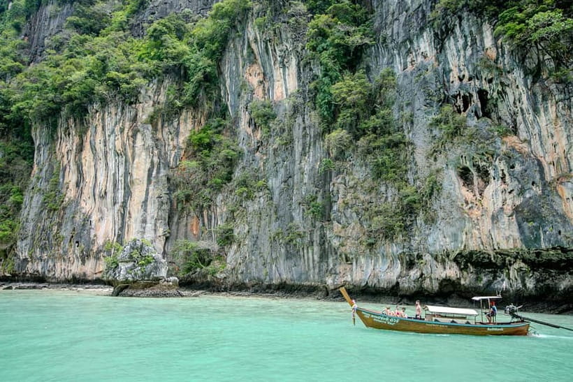 Phi Phi: 7 Island Longtail Boat Snorkeling Tour with Sunset - Maya Bay is the famous stop, with a catch