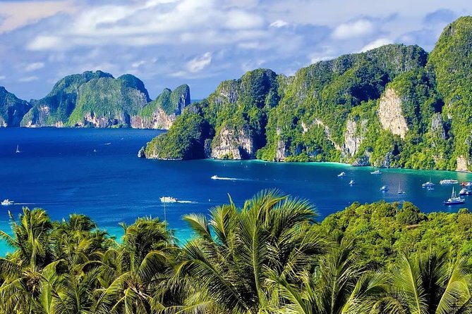 Phi Phi and Khai Islands Snorkeling Tour with Lunch by Speedboat - Ko Phi Phi Lee: dramatic cliffs from the water