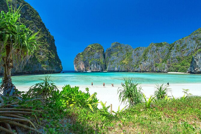 Phi Phi & Bamboo Island Full Day Tour by Premium Speed-Catamaran - Pileh Lagoon: Turquoise Water And Limestone Walls