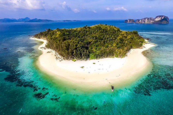 Phi Phi & Bamboo Islands Snorkeling Tour with Lunch by Speedboat - Ko Phi Phi Lee brings the cliffs into view