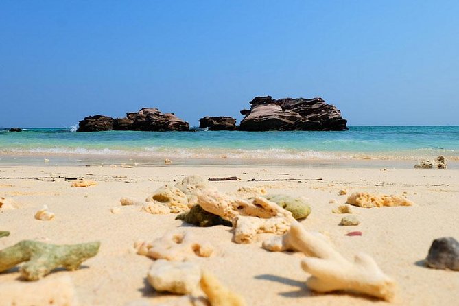 Phi Phi Islands One Day Tour by Speedboat From Phuket - Phi Phi Islands: dramatic cliffs and clear water