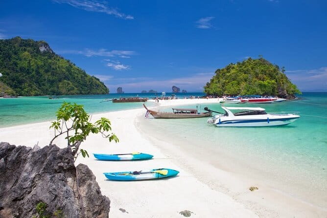 Phi Phi, Maya and Bamboo Islands Day Tour by Speedboat in Krabi - Pi Leh Bay: emerald water below sheer cliffs