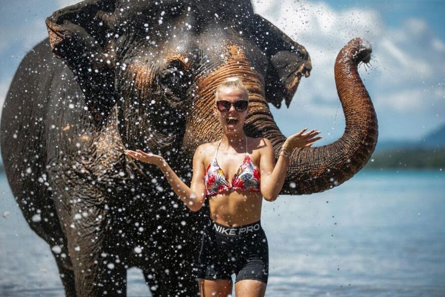 Phuket:Beach walk with elephants, rain & care. 2.5 hours - Brushing and bathing elephants in the sea