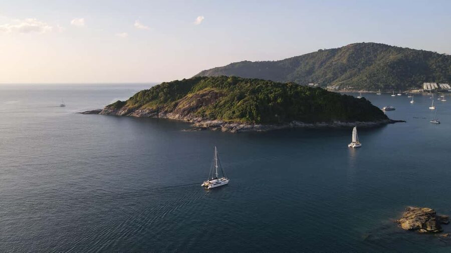 Phuket: Coral Island Snorkeling & Promthep Sunset Dinner - Dinner on deck as the sun drops