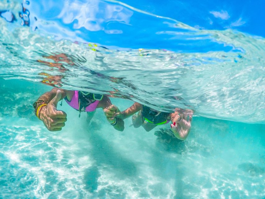 Phuket: Coral & Racha Islands Day Trip By Speedboat - Coral Island and Kahung Beach: lunch, chairs, and free time